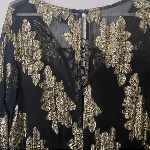 ASOS DESIGN Curve Metallic Frill Mini Dress With Lace Up  Neck In Black Pattern - Picture 12 of 14